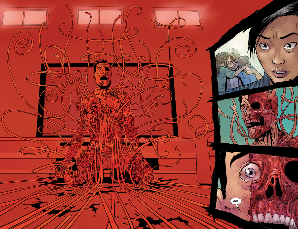 A man on his knees, literally being torn to ribbons